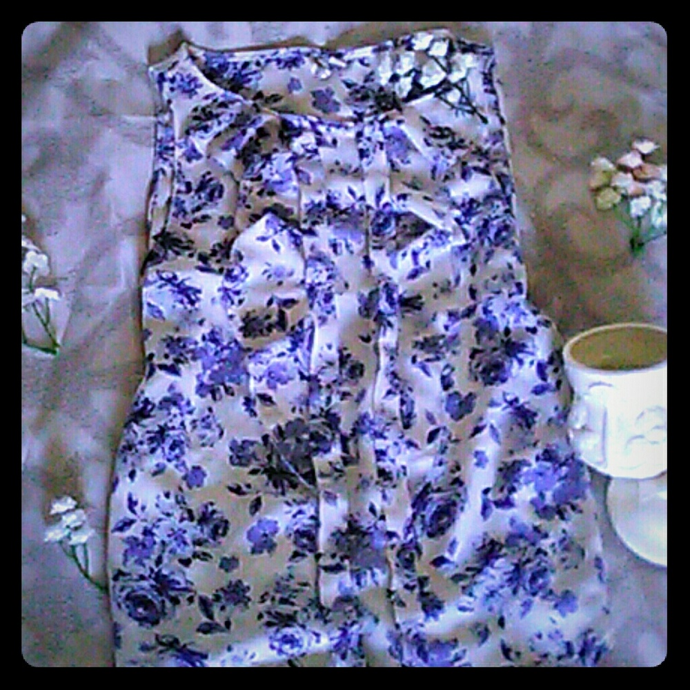 Elle sleeveless ruffle front blouse